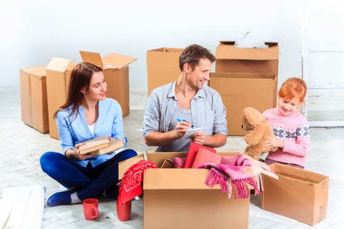Packed office boxes and furniture ready for relocation