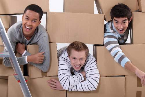 Loading furniture into a van for a local move