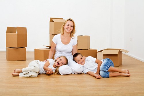 Professional moving team working on a residential street in Whetstone